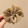 Nuevo y exquisito pasador de pelo con lazo 2026, un accesorio lujoso y de alta gama, con un diseño de pinza de plátano estilo coreano, creando un look dulce y moderno para mujeres