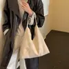Bolso de axila retro de gran capacidad para mujer, nuevo bolso de hombro versátil de moda 2026, bolso tote de alta gama para otoño e invierno