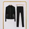 Conjunto de jaqueta com gola alta e calça cropped da marca LULU DF, em estoque, entrega direta, justo, respirável, elástico, com zíper dourado