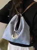 Bolso tote de gran capacidad para mujer, nuevo bolso de hombro de moda de verano 2026, mochila casual para estudiantes universitarios