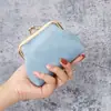 Fabricante directo de monederos vintage de clip, monederos de mujer de piel sintética, mini bolsas para guardar monedas y llaves al por mayor