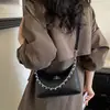 Bolso de mano pequeño de alta gama para mujer, nuevo bolso de moda 2026 con cadena para el hombro, bolso de hombro texturizado estilo coreano, bolso cruzado versátil