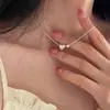 Conjunto de Colar e Pulseira Osso de Cobra Bola de Amor Feminino 2024 Novo Casual Mais Fácil de Combinar Temperamento de Nicho Colar Coração de Pêssego