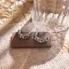 Pendientes de Botón Exagerados Exquisitos de Cristal Gris con Circonita Forma de C Pendiente de Temperamento de Moda Pendientes con Pasador de Plata de Ley 925 Sensación de Alta Gama Venta al por Mayor