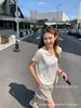 Artículo popular en stock: Top de hilo de papel japonés importado para mujer, nuevo estilo coreano de verano 2026, camiseta de manga corta transpirable de alta gama