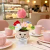 Muñecas de plantas tejidas a mano transfronterizas, decoraciones de plantas tejidas, flores artificiales de ganchillo para fiestas
