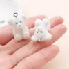 Peluche Oso de Peluche con Colgante de Pajarita de Terciopelo, Llavero Pulsera Bolso Encanto Accesorios de Oso Sentado de Felpa Venta al por Mayor