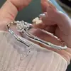 Pulsera de plata maciza de empuje y extracción transfronteriza nueva, pulsera floral de mariposa para mujer, pulsera ajustable de alta calidad para mujer