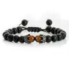Pulsera tejida de piedra volcánica transfronteriza europea y americana, pulsera de cuentas con corona de ojo de tigre galvanizado versátil retro, joyería de mano para hombre