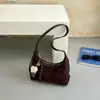 Bolso de mano informal transfronterizo, bolso de hombro, bolso cruzado, nuevo estilo vintage otoño 2026, gran capacidad, elegante, para el trabajo, tipo bolsa de albóndiga