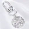 Lujo Ligero Chapado en Oro Full Diamante Charm Hebilla en Forma de D Colgante Hueco en Forma de Corazón Accesorios para Bolsos Llaves Fábrica Stock Mayorista