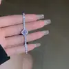 Pulseira Colar Trevo de Quatro Folhas Cravejado com Zircônia Cúbica Full Diamond Ajustável para Mulheres Design de Nicho Versátil Joias Fábrica Atacado