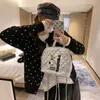 Cárdigan de punto con diseño de lunares retro de nicho estilo coreano para mujer, nuevo abrigo suéter ajustado de cuello redondo suave para otoño e invierno