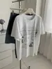 Camiseta Casual Feminina de Manga Curta Estilo Retrô Americano de Verão com Estampa de Perfume Desgastada, Modelo Soltinho e Relaxado de Comprimento Médio