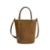 Bolsas populares de color block para mujer de este año 2026 nueva moda bolso cruzado versátil bolso de cubo de mano exquisito bolso tote pequeño