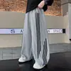 Calça Masculina Estilo Primavera e Outono 2026 Novo Estilo Crianças Maiores Outono Meninos Perna Larga Esportiva Roupas de Outono Infantis Estilo Cool Rogue Calça Longa