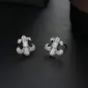 Pendientes de botón con flor de iris cruzada europea y americana, pedrería, personalidad para hombre, nuevo estilo, joyería de oreja de moda, accesorios de lujo ligero de alta gama para mujer