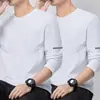 [Compre 1 Leve 1 Grátis] Camiseta de manga comprida de outono, segunda pele unissex, cor sólida, branca, modelagem solta, gola redonda, camiseta longa