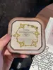 Pulsera Estilo Bucci Italiano Estrella de Cuatro Puntas Trébol de Cuatro Hojas para Mujer Lujo Ligero Nicho Diseño de Alta Gama Joyería de Mano Venta al por Mayor
