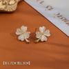 Pendientes Avanzados de la Serie Trébol de Cuatro Hojas Chapados en Cobre Oro Real Piedra Ojo de Gato Pendientes Lujo Ligero Moda Elegante Hebilla de Oreja de Celebridad de Internet
