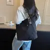 Bolsa tote casual de gran capacidad para mujer, nuevo bolso de hombro otoño 2026, bolsa de alta apariencia para estudiantes universitarios que van a clase