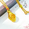 Loja de Ouro Mesmo Estilo Ouro Antigo Oco Filigrana Padrão de Moeda Cabeça de Buda Pingente Cobre Banhado a Ouro Portátil Pingente de Buda Corrente de Suéter