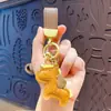 Llavero de Herradura de Cuero de Dibujos Animados Creativos "Hazte Rico al Instante" Colgante Lindo para Bolsa Llavero de Coche Regalo Venta al por Mayor