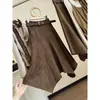 Elegante saia de camurça assimétrica em estilo retrô para mulheres, nova coleção outono/inverno, cintura alta, saia evasê que afina o corpo com barra flare