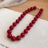 Collar ajustable de cuentas redondas acrílicas, sensación de lujo ligero y alta gama, cadena simple para la clavícula, accesorio moderno y versátil, venta al por mayor