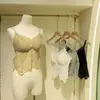 2026 Primavera/Verano encaje finamente tejido sexy delgado copa fija anti-exposición wrap chest sujetador de una pieza