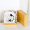 Taza de esmalte de rosa vaso doméstico resistente a altas temperaturas taza de separación de té oficina juego de té regalo para pareja fábrica de tazas