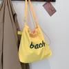 Bolsa Tote Versátil da Moda para Mulheres 2026 Nova Moda Bolsa de Nylon Pregueada Grande Capacidade para Trabalho e Deslocamento Bolsa de Ombro