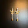 Aretes 2025 Trendy Retro Industria Pesada Estilo Étnico Aretes Versátiles para Mujeres Lujo Accesible Elegantes Largos Clips para Orejas sin Perforación para Mujeres