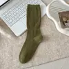 Miu miu ar ~ padrão sombrio meias espiga de trigo femininas primavera outono retrô oca de cano médio sapatos Birkenstock meias grossas de confinamento