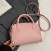 Coreia do Sul Casual Simples Cor Sólida Nicho Portátil Bolsa Boston Fashionável Versátil Texturizada Lichia Comutadora Transversal