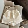 Pantalones cortos de felpa color blanco roto para mujer, adecuados para otoño e invierno, pantalones de pierna ancha de cintura alta en línea A, perfectos para combinar con botas