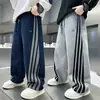 Ropa Infantil Niños Pantalones Deportivos Rectos con Raya Lateral Primavera y Otoño 2026 Niños Grandes Pantalones de Punto Holgados Primavera Venta al por Mayor Transfronteriza