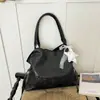 Bolsa tote de gran capacidad, bolso de hombro casual moderno para llevar bajo el brazo, diseño de nicho único y elegante, bolso de mano personalizado y de moda