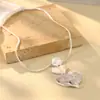 Moda europea y americana diseño de nicho pendientes geométricos tridimensionales anillo de plata oro cepillado collar de color amor joyería exagerada