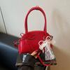 Moda Verano 2025 Simple Casual Retro Nicho Nuevo Bolso Satchel de Hombro Diagonal para Mujer con Lazo