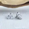 Aleación de Titanio Astmf-136 Fondo Redondo Garras Incrustadas Zircón Lirio Titanio G23 Rosca Interna Cabeza de Joyería de Pendientes de Zirconio