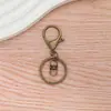 Set de Tres Piezas de Dijes para Bolsa con Broche de Langosta de Aleación de Zinc 308 Chapado, Llavero de Figura de Ocho y Pequeño Colgante del Festival Qixi