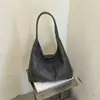 Bolso de Hombro Individual Texturizado Color Sólido Retro 2026 Otoño Nuevo Casual Personalidad Gran Capacidad Bolso de Mano para el Trabajo Moderno