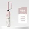Paraguas creativo con hebilla de anillo de apertura manual al 70% de descuento, protección solar, doble uso para lluvia y sol, paraguas de negocio con recubrimiento negro, sombrilla de estilo japonés simple al por mayor