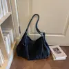 Bolso bandolera de mezclilla de color liso estilo Ins, nuevo bolso de hombro tipo tote de gran capacidad estilo coreano 2026 para estudiantes, adecuado para la escuela y el trabajo.