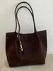 Bolsa tote casual de grande capacidade, cor sólida, nova versão coreana outono 2026, bolsa de mão e bolsa de ombro personalizadas para trabalho e deslocamento