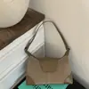 Bolsa de Camurça Feminina 2025 Nova Tendência Outono e Inverno Bolsa de Mão Retrô Bolsa de Ombro Único Transversal de Alta Qualidade Nicho