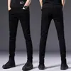 Jeans negros de alta gama italianos que no se decoloran para hombre, pantalones casuales ajustados elásticos de estilo coreano para otoño e invierno
