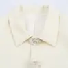 Roupas casuais femininas de cor sólida para o outono, atacado para exportação, estilo europeu e americano, moda transfronteiriça, jaqueta curta com botões florais tridimensionais