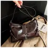 Bolso bandolera cruzado de un solo hombro estilo europeo y americano vintage de gran capacidad con cierre de hebilla 2026, nuevo para commuting, retro chic